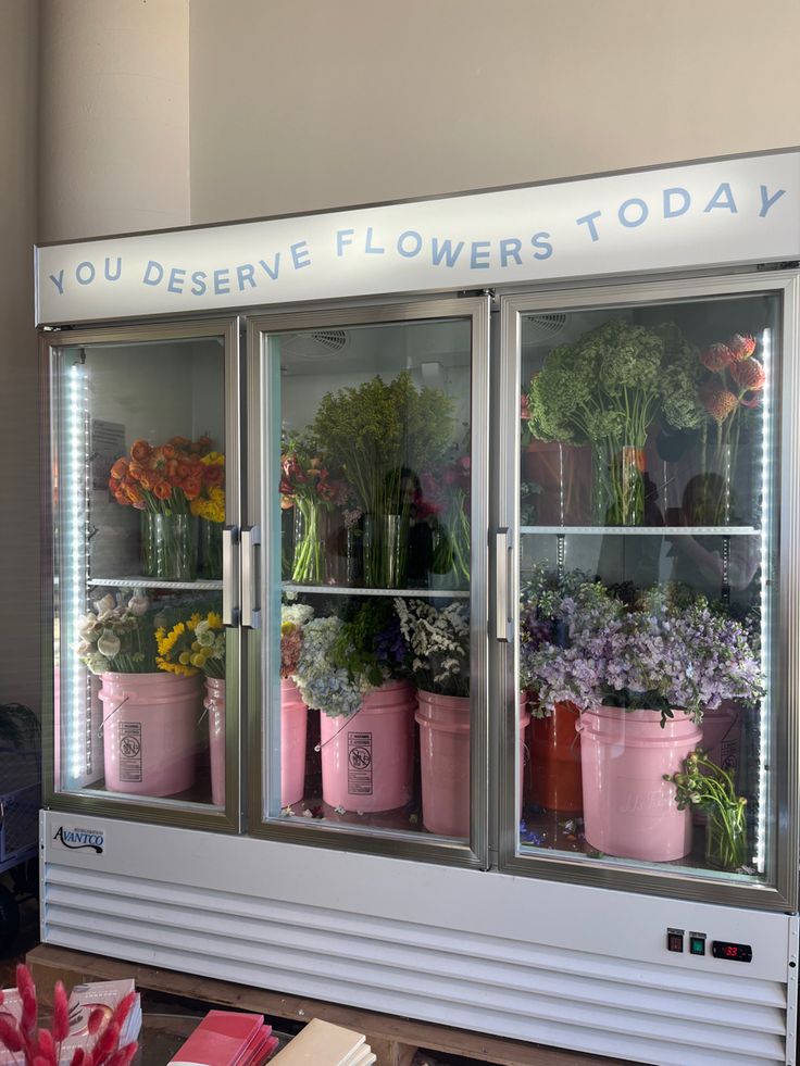 Vibrant Floral Display Enhances Cafe's Inviting Atmosphere