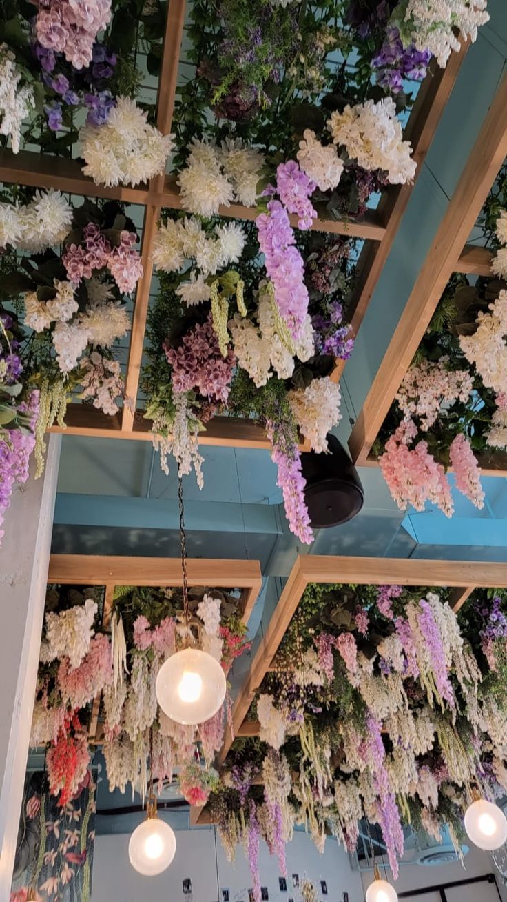 Vibrant Floral Ceiling Transforms Cafe into Inviting Oasis