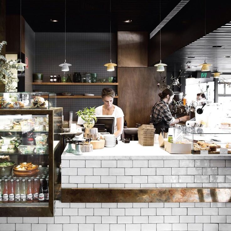 Modern Cafe Design: A Welcoming Mix of Warm Woods and Sleek Finishes