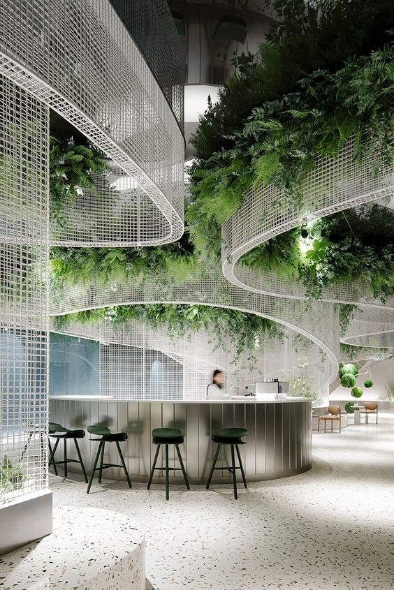 Modern Cafe Design: A Harmonious Blend of Nature, Architecture, and Interactive Spaces