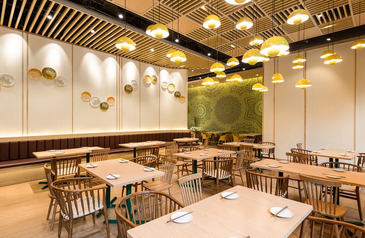 Modern Cafe Design Fostering Community with Inviting Atmosphere and Artistic Touches