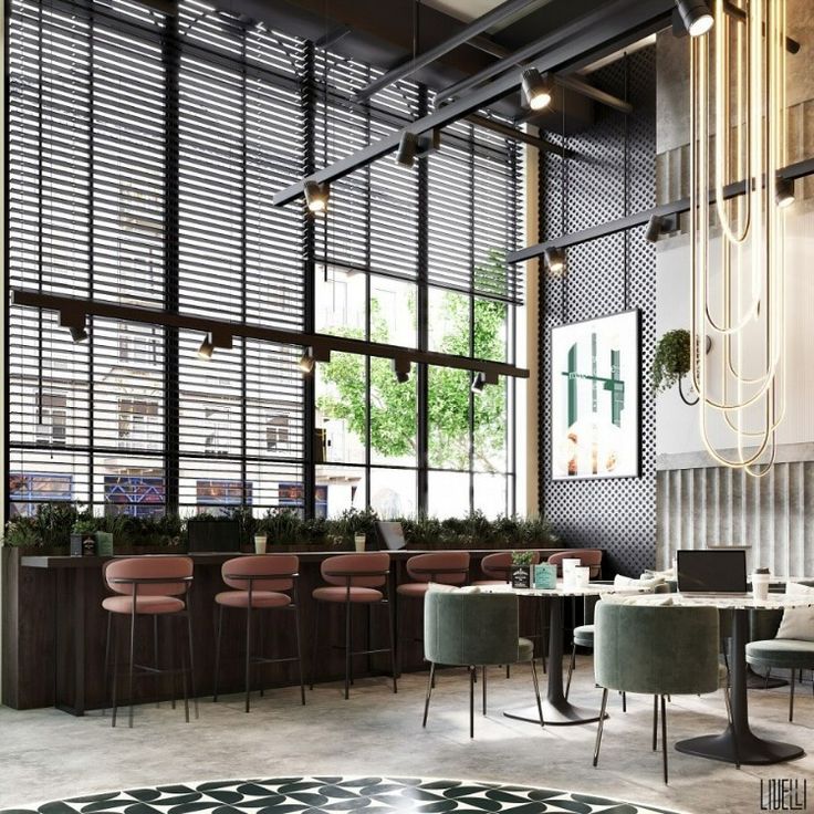 Modern Cafe Design Blends Industrial and Contemporary Aesthetics with Natural Light and Chic Seating