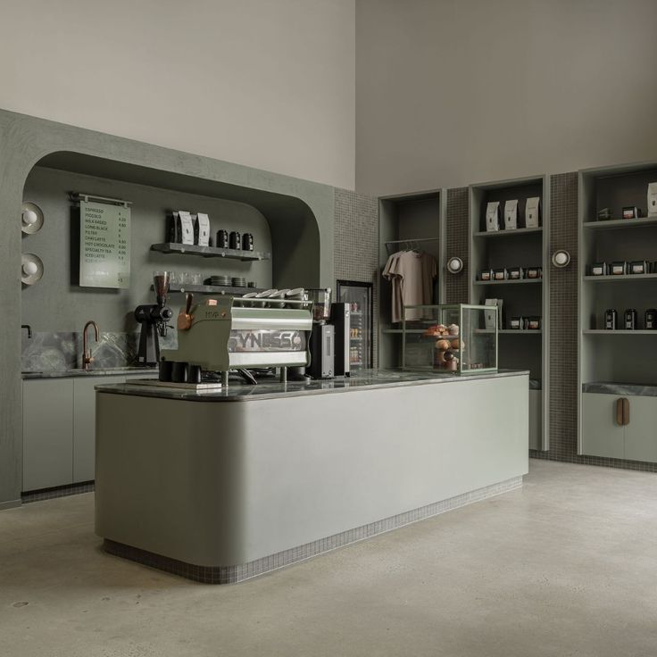 Modern Minimalist Cafe Design with Calming Green Aesthetic and Engaging Features