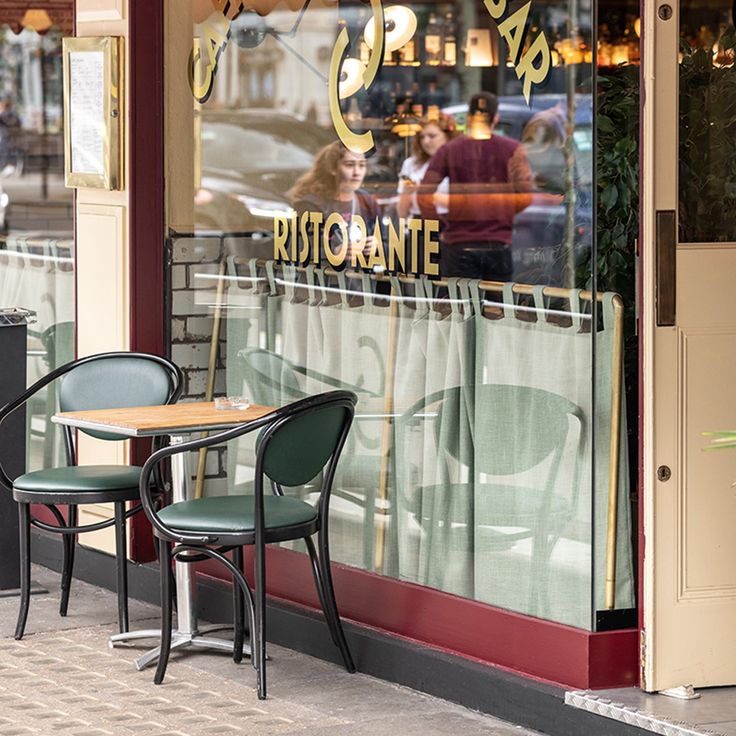 Inviting Cafe Design Blends Contemporary and Classic Aesthetics with Cozy Outdoor Seating