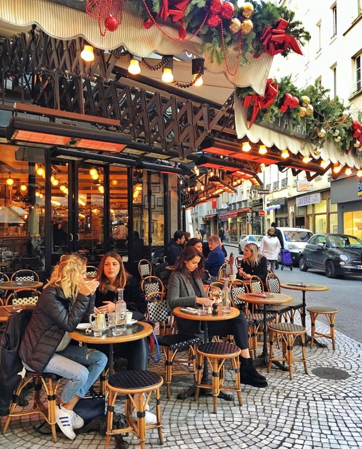 Charming Cafe with Enchanting Outdoor Seating and Festive Decor