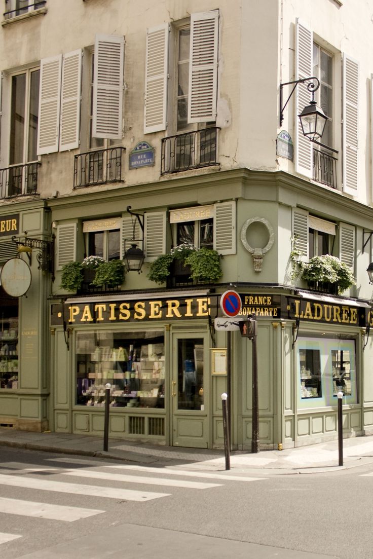 Charming Parisian Cafe Design with Elegant Corner Patisserie and Inviting Atmosphere