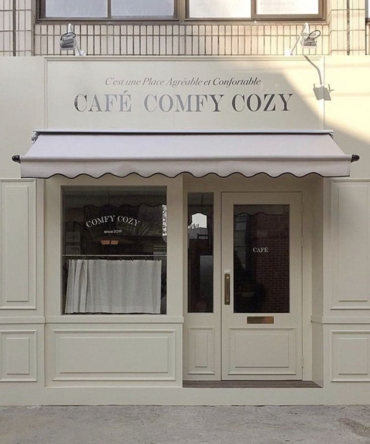 Charming Cafe Design Fuses Comfort and Sophistication with Inviting Exterior and Elegant Architectural Elements