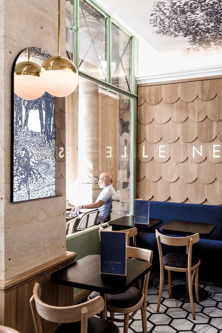 Elegant Cafe Design: A Harmonious Blend of Natural Materials and Modern Aesthetics