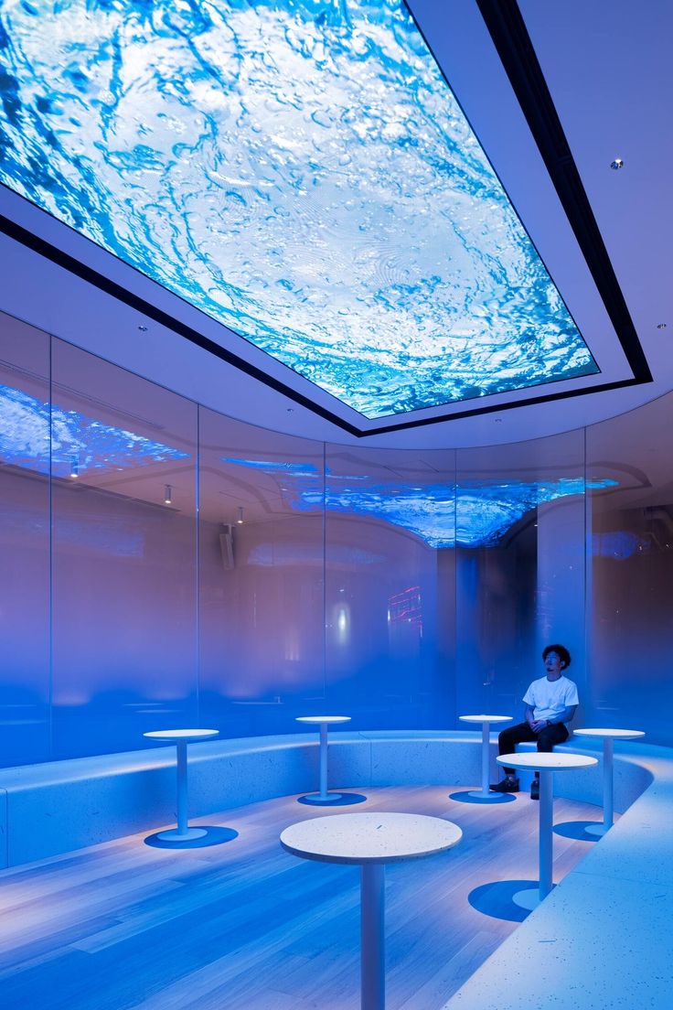 Innovative Cafe Design: An Immersive, Serene Environment Inspired by Shimmering Water