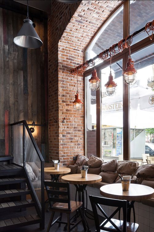 Cozy Industrial Cafe Design with Inviting Atmosphere and Stylish Accents