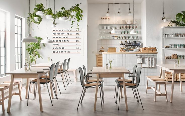 Minimalist Cafe Design: Light, Airy Atmosphere with Modern Comfort and Natural Elements