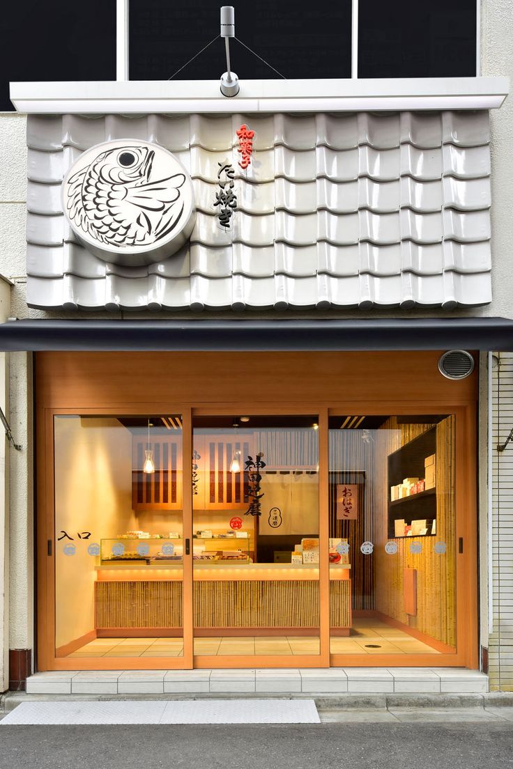 Charming Cafe Harmonizes Traditional Asian Architecture with Contemporary Design