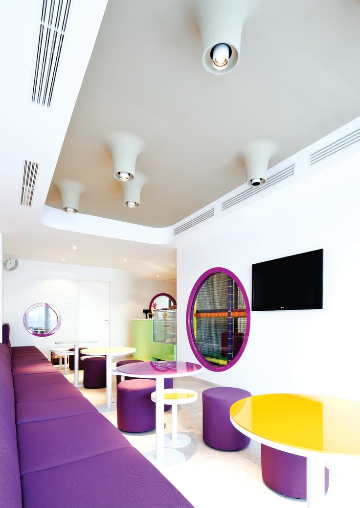 Vibrant Modern Cafe Design Fosters a Playful and Inviting Atmosphere