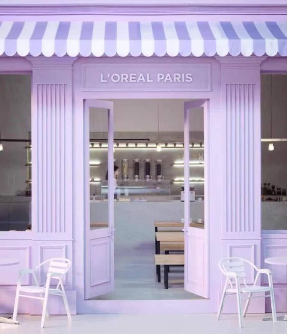 Charming Cafe Design Balances Whimsy and Elegance with Inviting Lavender Exterior