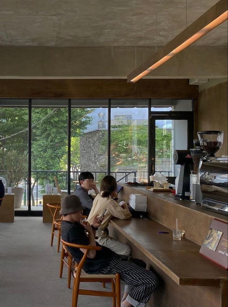 Contemporary Cafe Design: Harmonizing Comfort and Aesthetic with Natural Light and Warmth