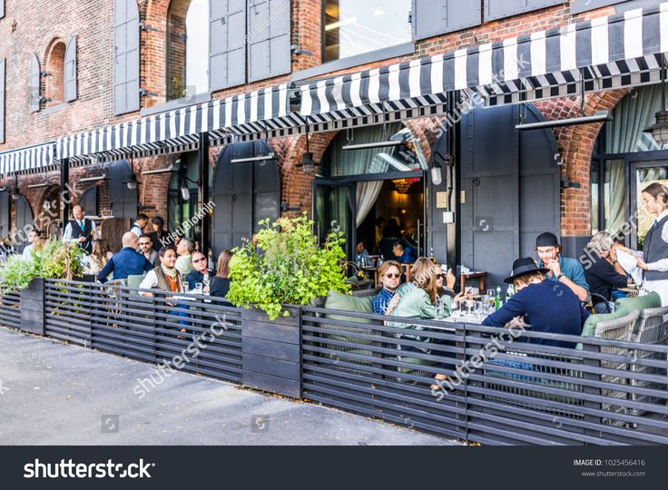 Charming Cafe Design with Rustic Facade and Inviting Outdoor Seating