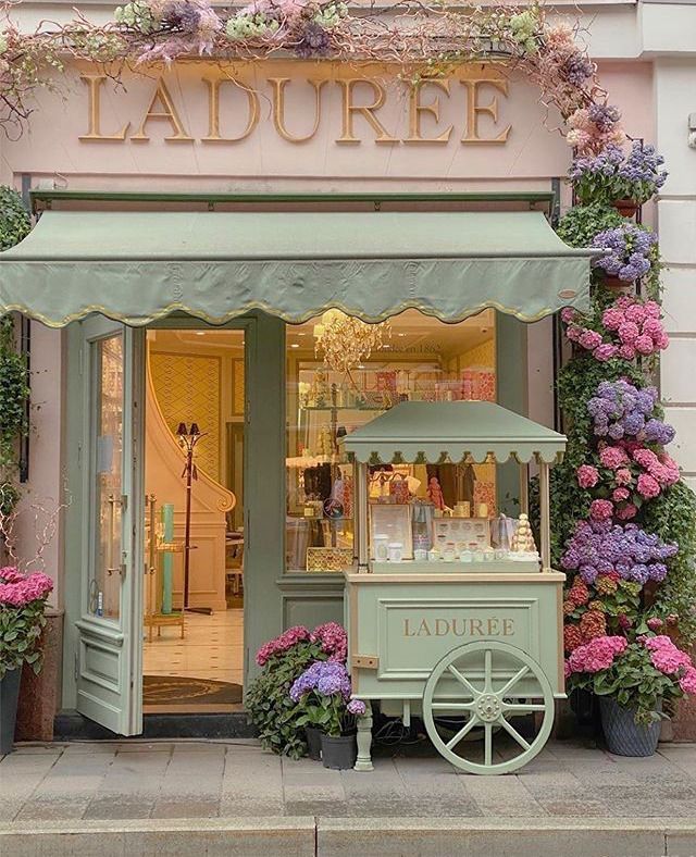 Charming Pastel Cafe Design with Floral Facade and Vintage Aesthetic