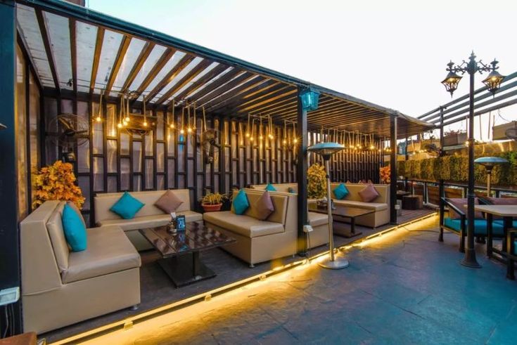 Chic Outdoor Cafe Seating with Modern Design and Inviting Ambiance