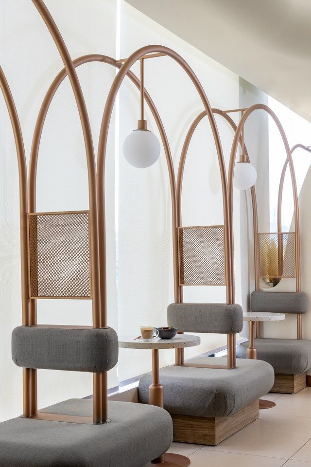 Contemporary Cafe Design: Elegant Arches and Warm Aesthetics for Inviting Spaces