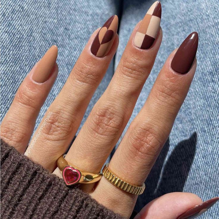 Stylish Nail Art in Earthy Tones Enhanced by Elegant Jewelry