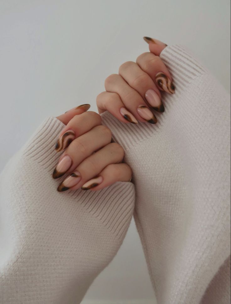 Chic Comfort: Elegant Nail Art and Cozy Sweater Vibes Perfect for a Cafe Ambience