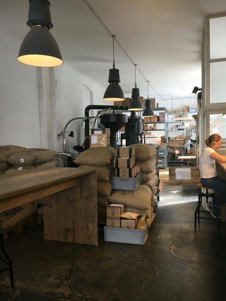 Industrial Chic Cafe: A Minimalist Space with Natural Light and Warmth