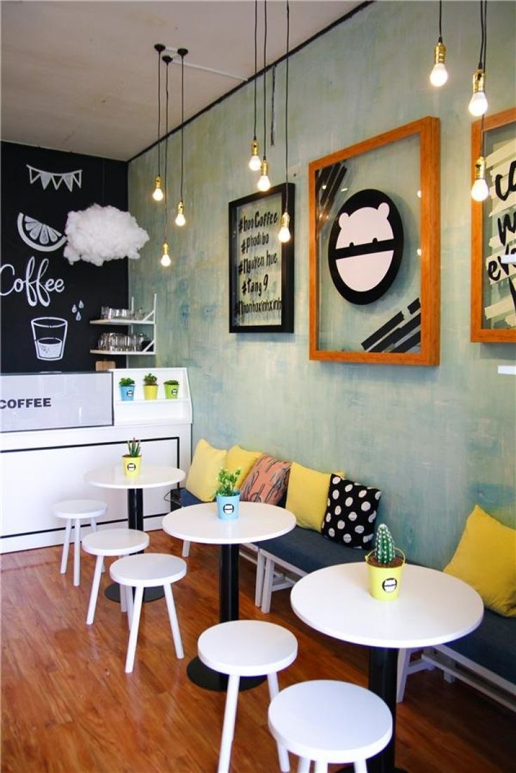 Charming Cafe Design: A Cozy Blend of Modern and Whimsical Elements for Relaxation and Socializing