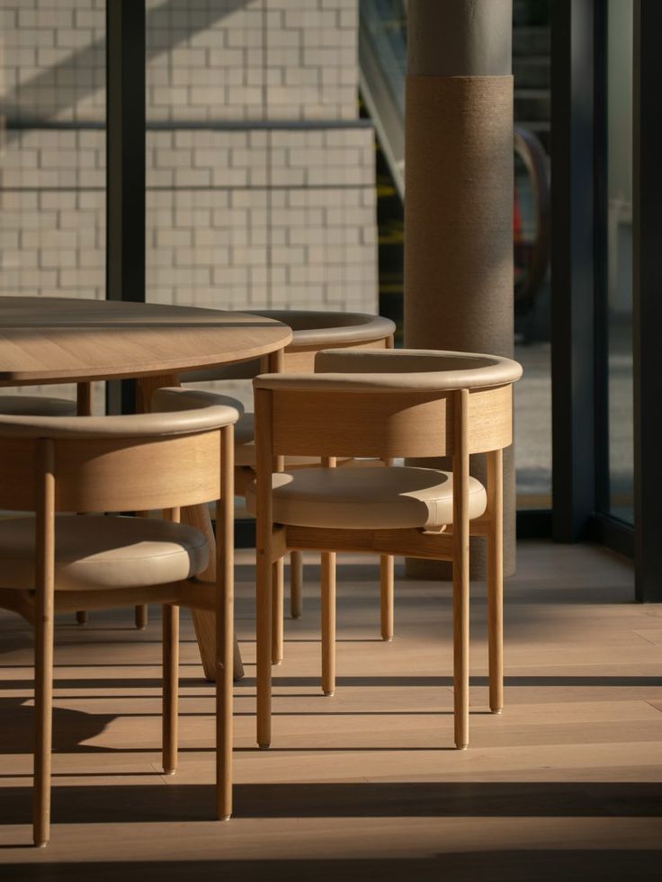 Cozy and Modern Cafe Design: Natural Wood, Abundant Light, and Minimalist Aesthetic