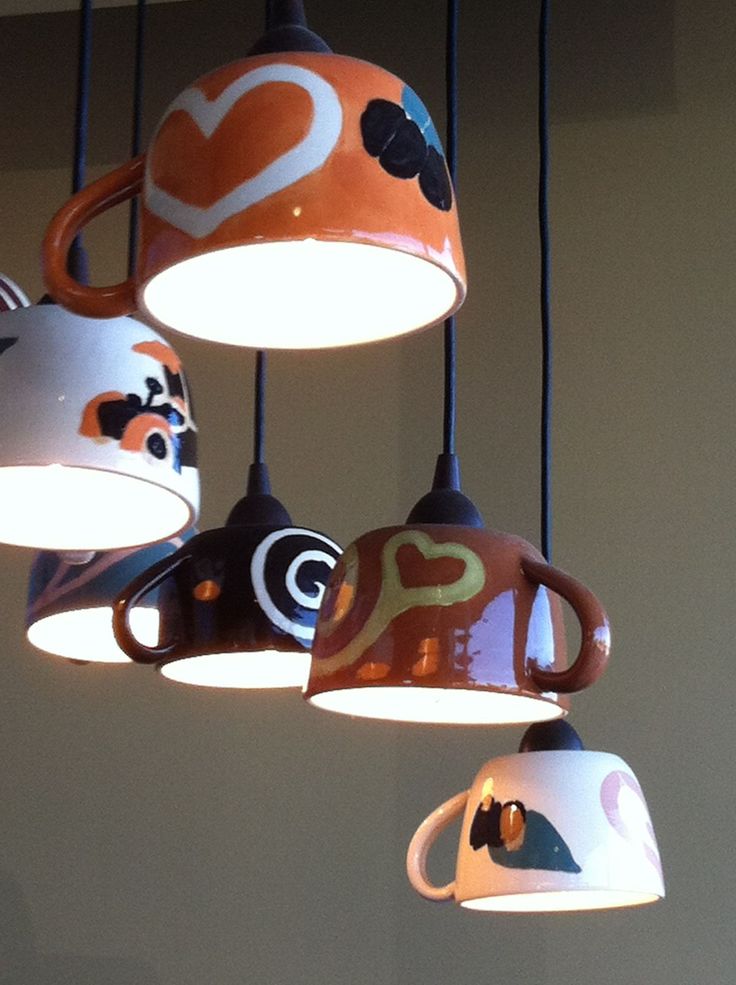 Whimsical Mug Pendant Lights Create a Cozy and Artistic Vibe in the Cafe