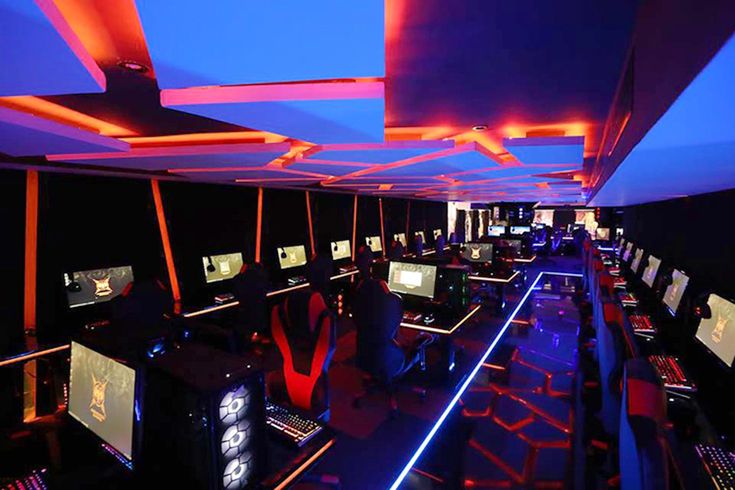 Modern Gaming Cafe Design: An Immersive Community Space with Dynamic Lighting and High-End Tech