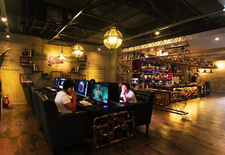 Modern Gaming Cafe: A Stylish Fusion of Industrial Aesthetics and Inviting Atmosphere