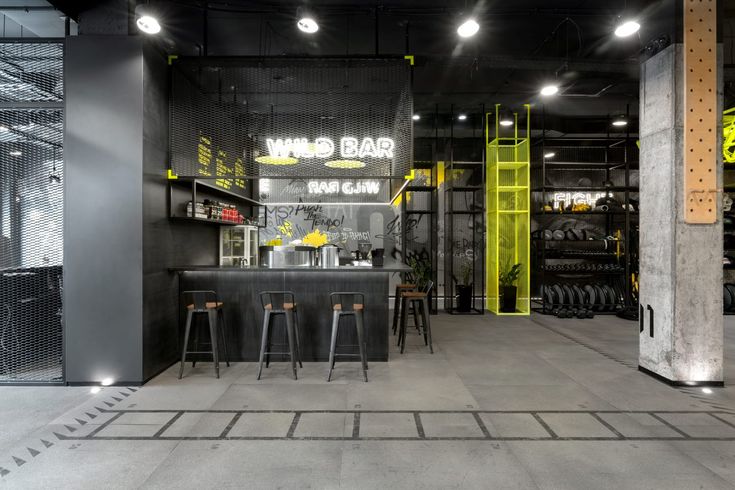 Modern Industrial Cafe Design: A Chic Fusion of Dark Elegance and Vibrant Accents