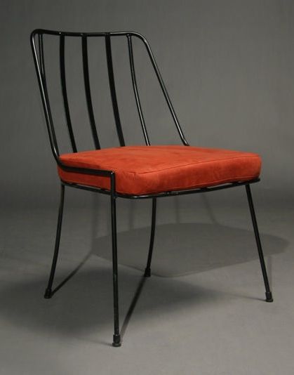 Sleek and Stylish Cafe Chair with Modern Black Metal Frame and Vibrant Orange Cushion