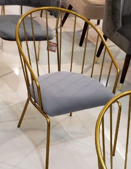 Sleek Gold-Frame Chair with Stylish Gray Upholstery for Chic Dining Spaces