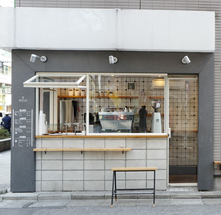 Modern Minimalist Cafe Design: A Transparent and Inviting Urban Space