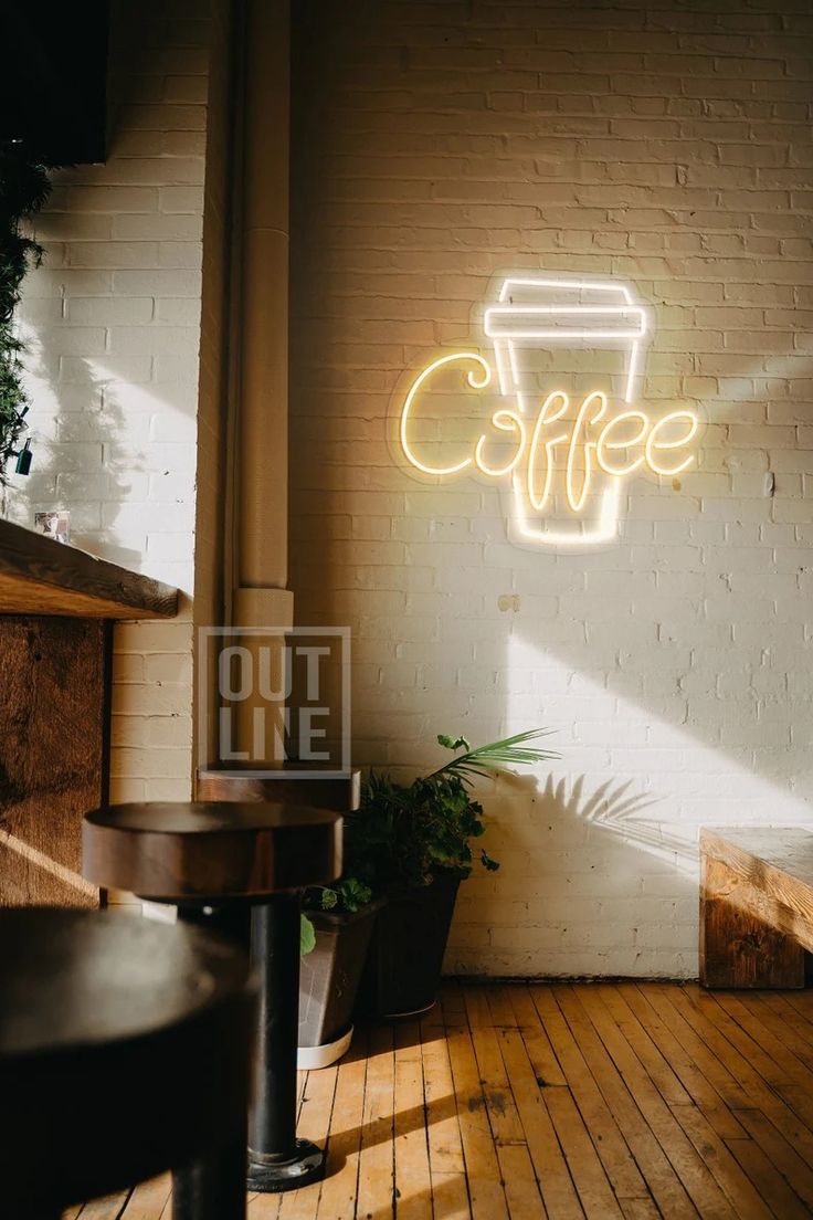 Charming Cafe Design: A Cozy Blend of Brick, Neon, and Natural Light