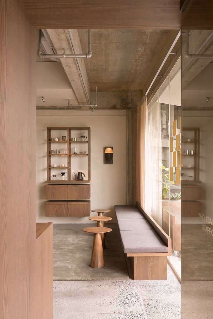 Cozy Cafe Design: A Harmonious Blend of Wood Elements and Minimalist Aesthetics