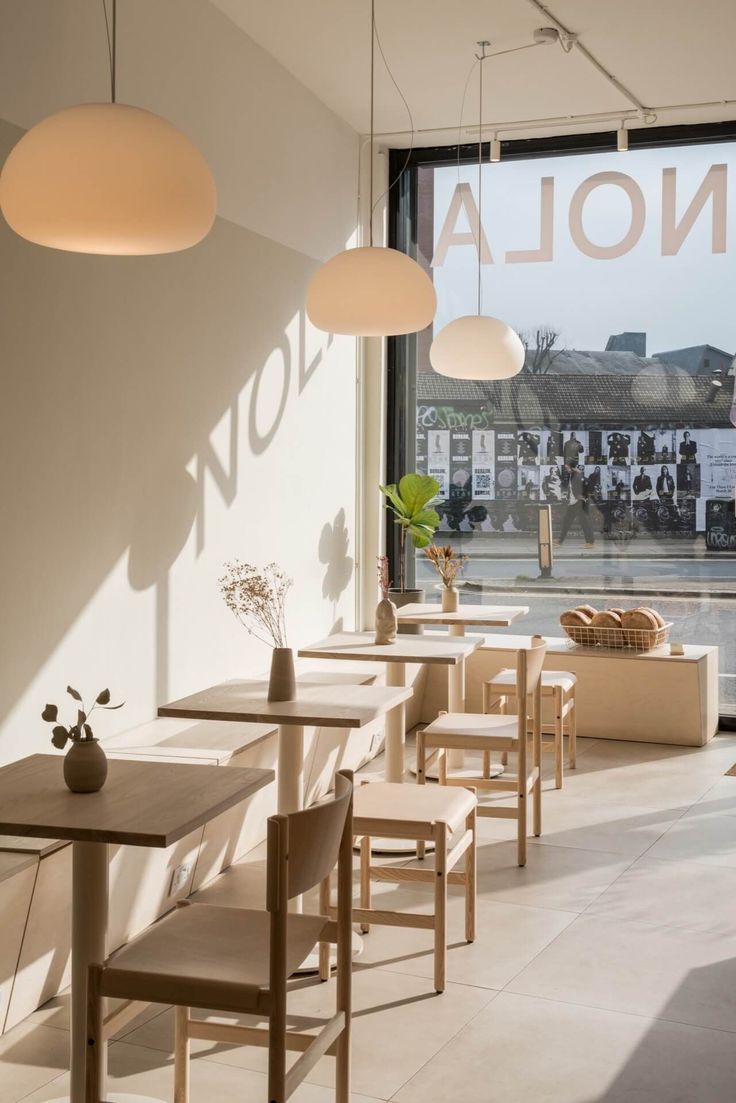 Modern Minimalist Cafe: A Serene Space of Warm Tones and Natural Light