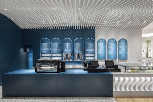 Modern Aesthetic Cafe Design: Sleek Minimalism with Deep Blue and White Elements