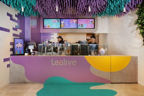 Vibrant Modern Cafe Design with Colorful Murals and Dynamic Elements