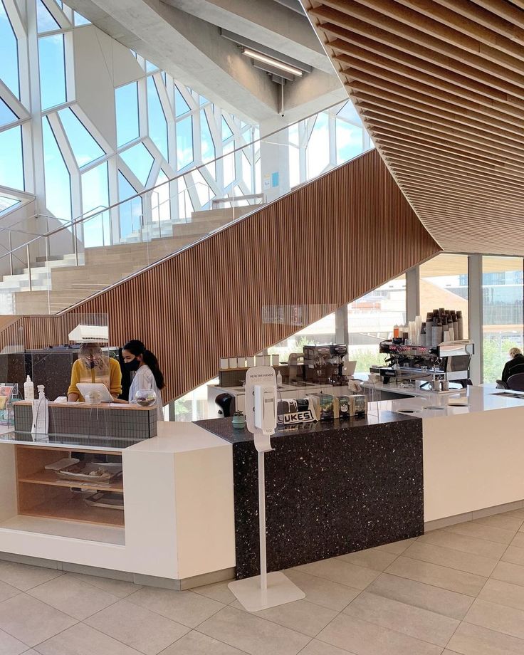 Modern Cafe Design: A Bright, Inviting Space Emphasizing Clean Lines and Natural Light