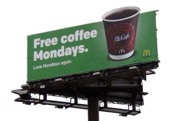 Transforming Mondays: A Cafe Billboard Promotion Celebrating Freshness, Community, and Free Coffee