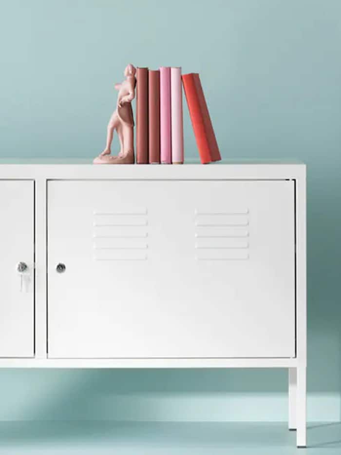 Sleek Minimalist Cabinet Design: A Blend of Functionality and Playful Decor