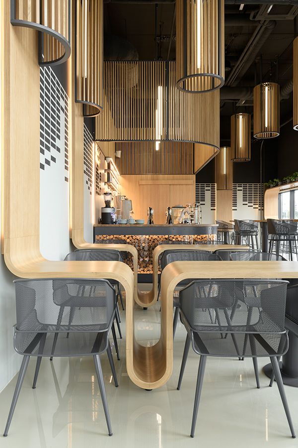 Modern Cafe Design: A Harmonious Blend of Natural Materials and Contemporary Elegance