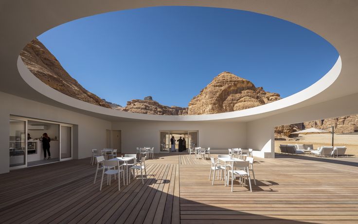 Serene Cafe Design Harmonizes Nature and Modern Minimalism with Circular Roof Opening