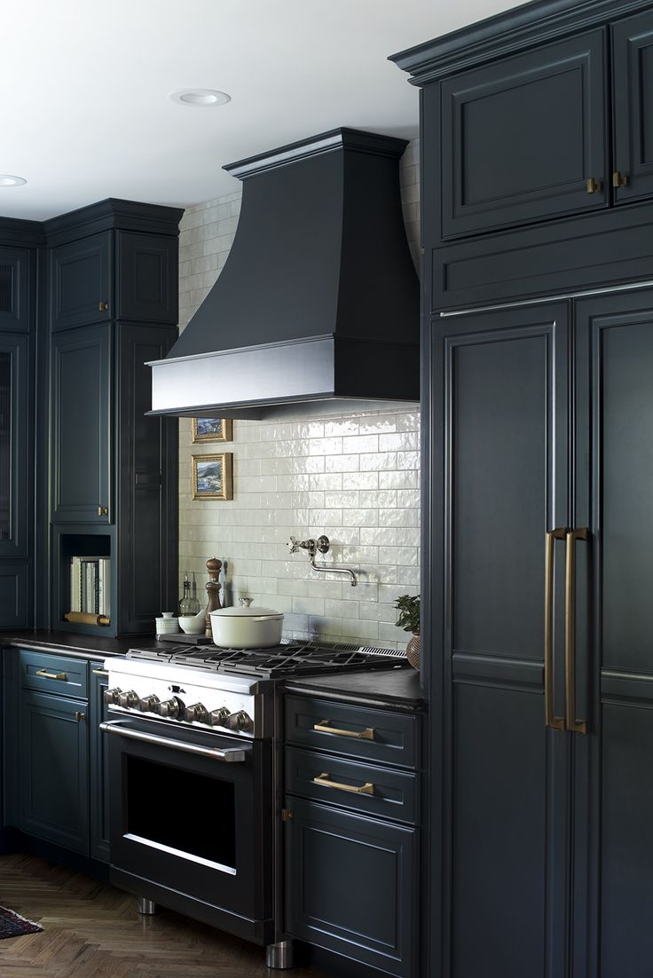 Sophisticated Modern Classic Kitchen Design with Elegant Navy Cabinetry and Functional Accents