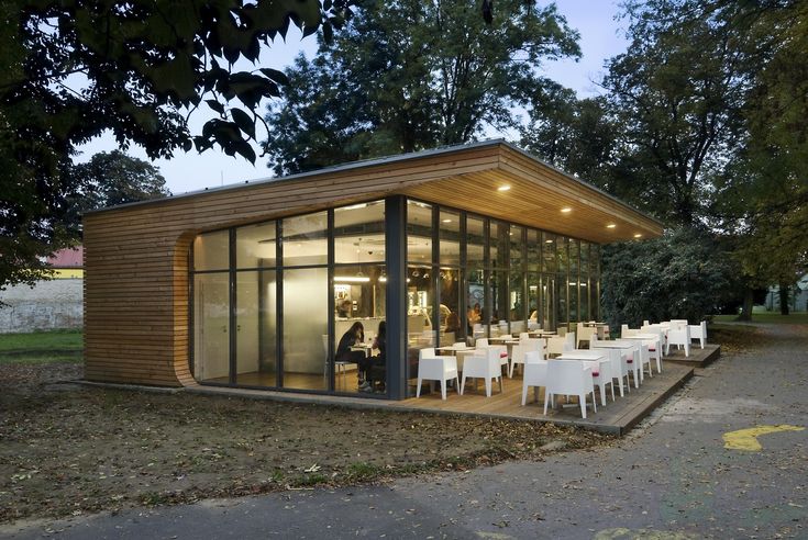 Modern Cafe Fuses Sleek Design with Natural Surroundings for a Relaxing Community Experience