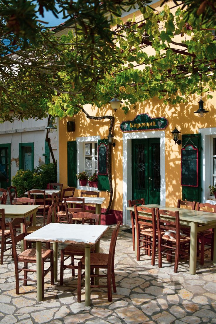 Charming Cafe Design with Rustic Outdoor Patio and Mediterranean Aesthetic