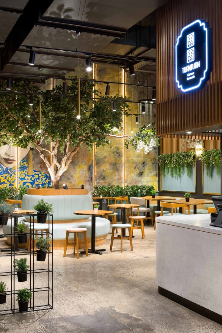 Cafe Combines Natural Elements and Modern Aesthetics for a Inviting Atmosphere