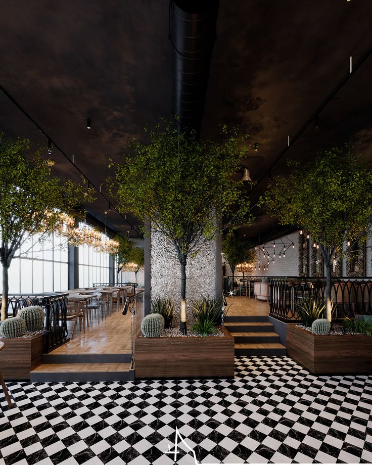 Modern Cafe Design: A Cozy Blend of Industrial Style and Vibrant Greenery